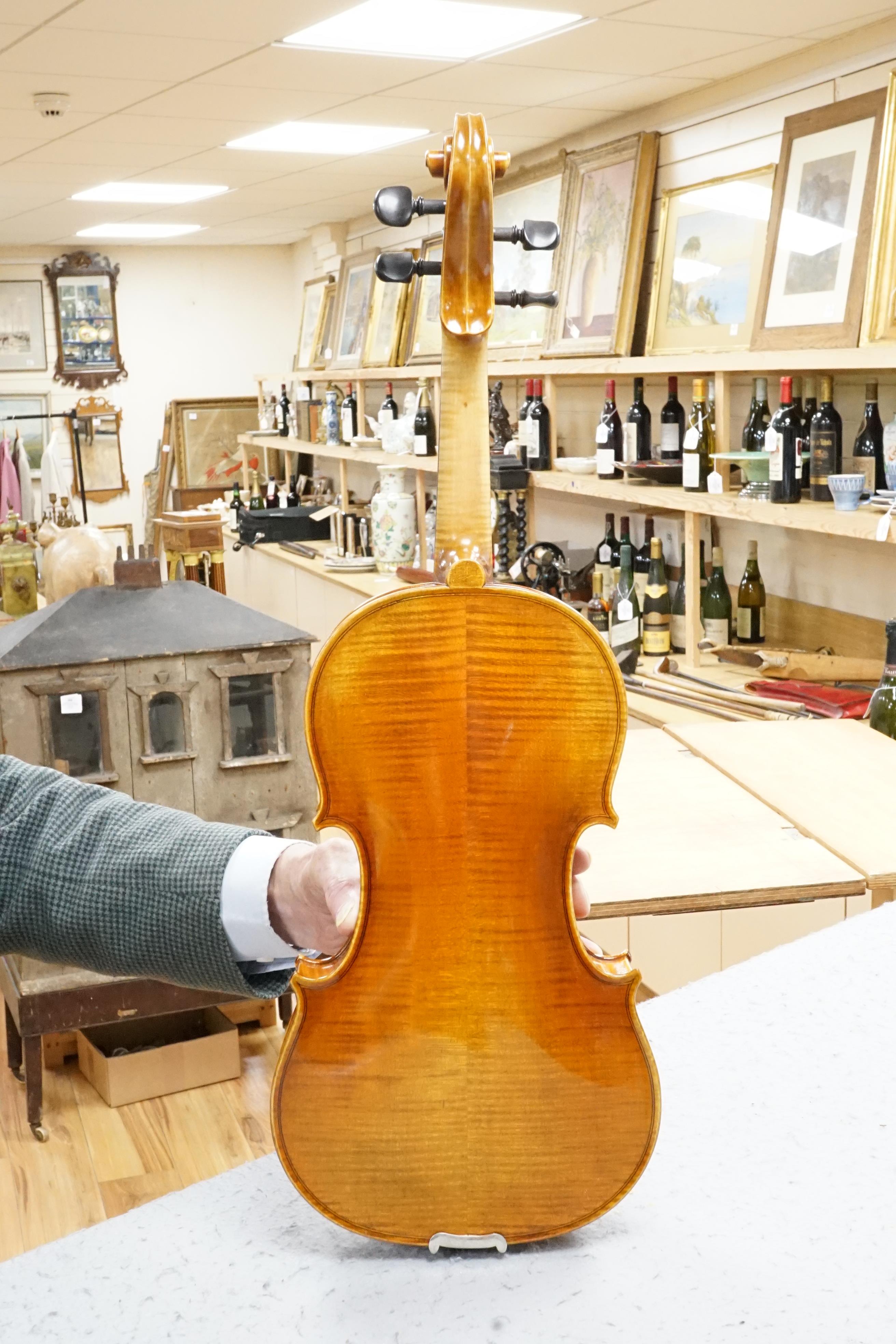 A cased German violin